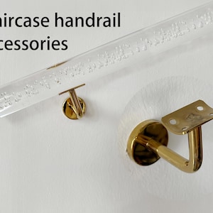 Gold handrail brackets, modern handrail brackets, wall mounting brackets, square handrail and oval handrail fixings.