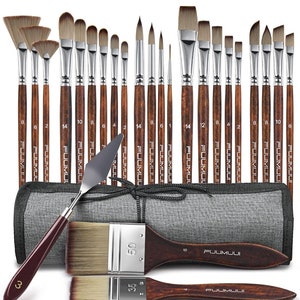 May include: A set of 24 paint brushes with wooden handles and silver ferrules, including a palette knife and two large brushes. The brushes are arranged in a gray canvas roll with a black drawstring. The roll has the word "FUUMUU" printed on it.