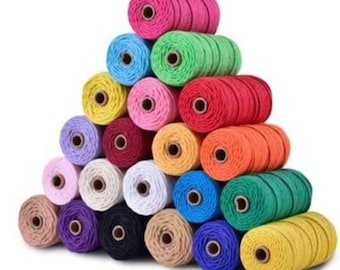 May include: A collection of 20 spools of colorful cotton twine, arranged in a pyramid shape. The twine is available in a variety of colors, including red, blue, green, yellow, and purple.