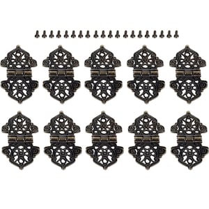 May include: Ten antique-style brass hinges with intricate filigree designs. Each hinge is approximately 1.5 inches in length and comes with two screws for installation.