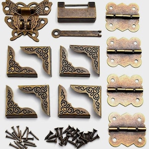 May include: A set of antique brass hardware for crafting projects, including a butterfly latch, hinges, corner brackets, nails, and screws.
