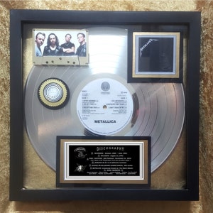 METALLICA &quot;Black&quot; award.  31-million sold worldwide