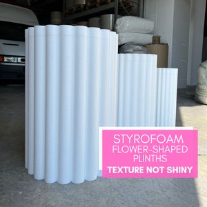 Flower-shaped styrofoam cylinders, hollow foam cylinders, white party plinths