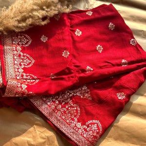 Maroon-red Silk Dupatta with Latkans and Intricate Border Work – Elegant Ethnic Wear
