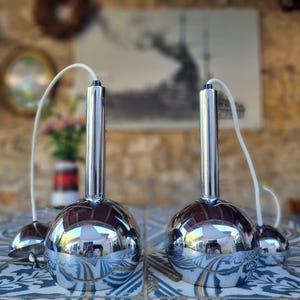 Set of 2 vintage Harvey Guzzini Chrome Lamps