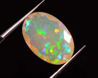 Ethiopian Opal Gemstone: 4 Ct Oval Cabochon Loose Cut