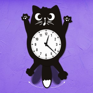 May include: Black cat-shaped wall clock with a white face and black hands. The clock has a long tail that swings back and forth.