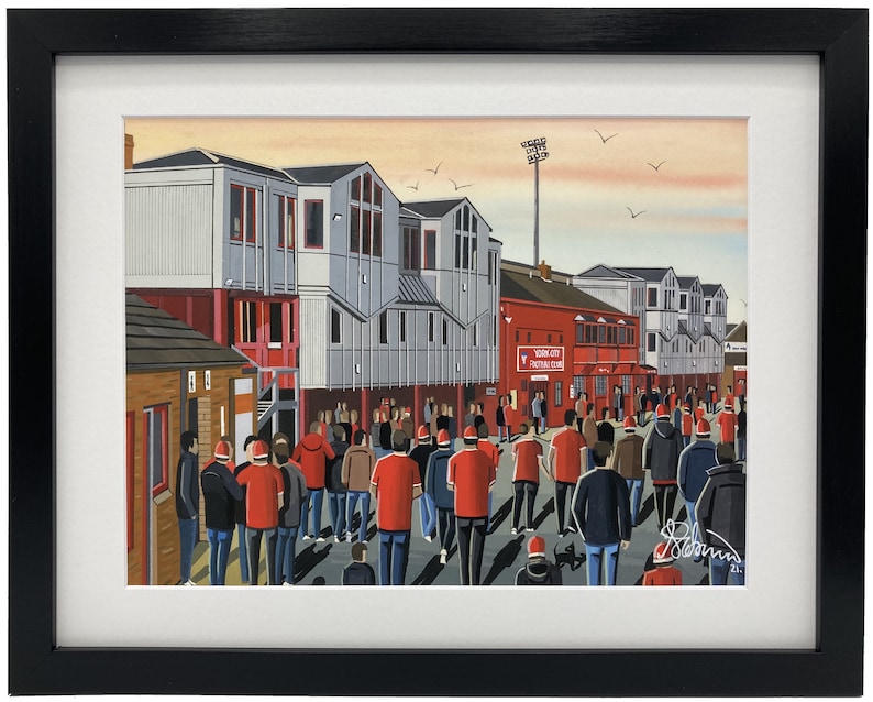 York C. Retro Bootham Crescent football stadium. Ready to hang framed & mounted City art print. Ideal wall art football club F.C memorabilia gift for birthdays, Christmas, Father’s Day. Perfect addition to any home or office. By artist Andrew Robinson.