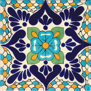 May include: Square ceramic tile with a floral design. The tile features a central turquoise flower with an orange center, surrounded by green leaves. Dark blue, white, and yellow accents create a decorative border.