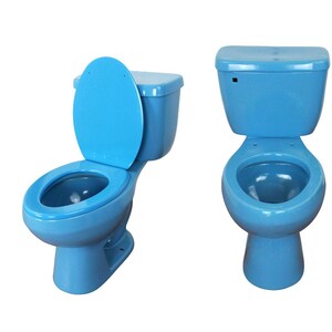 May include: Two bright blue ceramic toilets shown from different angles. One toilet is displayed from a side perspective with the lid and seat raised, while the other is shown from a direct front-facing view with the lid and seat closed.