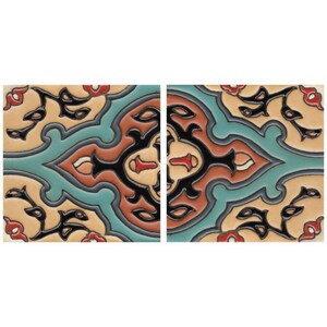 May include: Two ceramic tiles with a geometric pattern in shades of blue, green, red, black, and cream. The tiles feature a repeating design of stylized leaves and flowers.