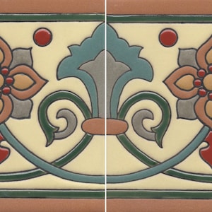 May include: A rectangular ceramic tile featuring a repeating pattern of stylized flowers and scrolling vines in shades of cream, terracotta red, sage green, and grey. The design includes symmetrical floral motifs with central red dots.