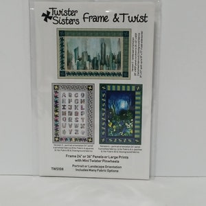May include: A white card with a colorful image of a cityscape, a letter alphabet, and a forest scene. The card is titled "Twister Sisters Frame & Twist" and includes the text "Frame 24" or 36" Panels or Large Prints with Mini Twister Pinwheels" and "Portrait or Landscape Orientation Includes Many Fabric Options". The card also includes the product code "TWS108".