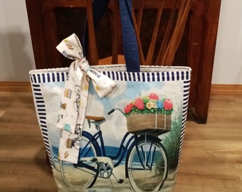Beach or Market Tote made with Beach Time Panel 04912-PA.  Tote measures 16"H X 14"W X 6"D -  11" handles, inside pocket, & removable bow!