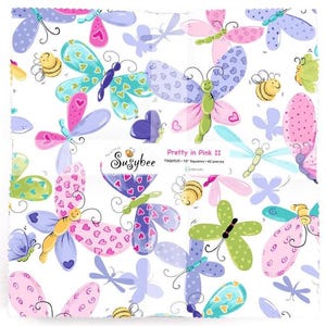 May include: A square fabric panel featuring a whimsical butterfly and bee design in shades of pink, blue, green, and yellow on a white background. The text "Pretty in Pink II" is visible. The panel includes 10-inch squares and 42 pieces.