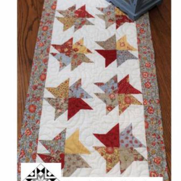 Charming Spinning Pinwheels Table Runner Pattern #345 by Creek Side Stitches. Table runner measures 18 " X 44"