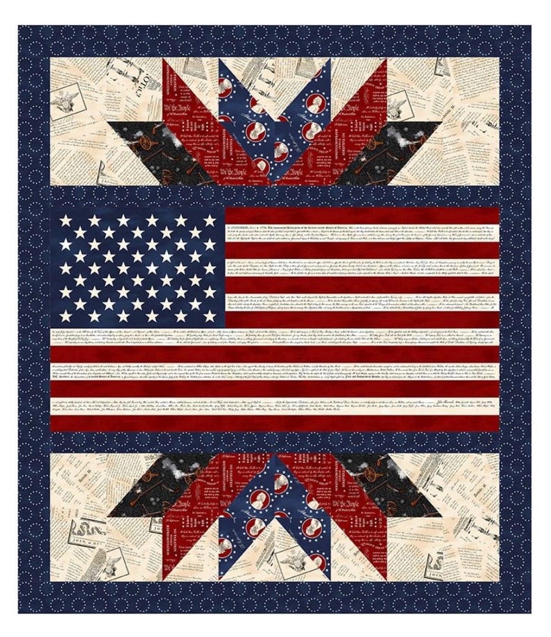 May include: A patriotic quilt featuring the American flag with red and white stripes and a field of white stars on a blue background. The quilt has a blue border with white dots and star-shaped patterns.