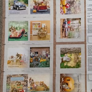 May include: A fabric panel featuring multiple illustrated scenes of squirrels engaged in various activities. The scenes include squirrels in a car, a truck, and a pumpkin patch. Text includes "Skipper's Busy Day!" and other phrases.