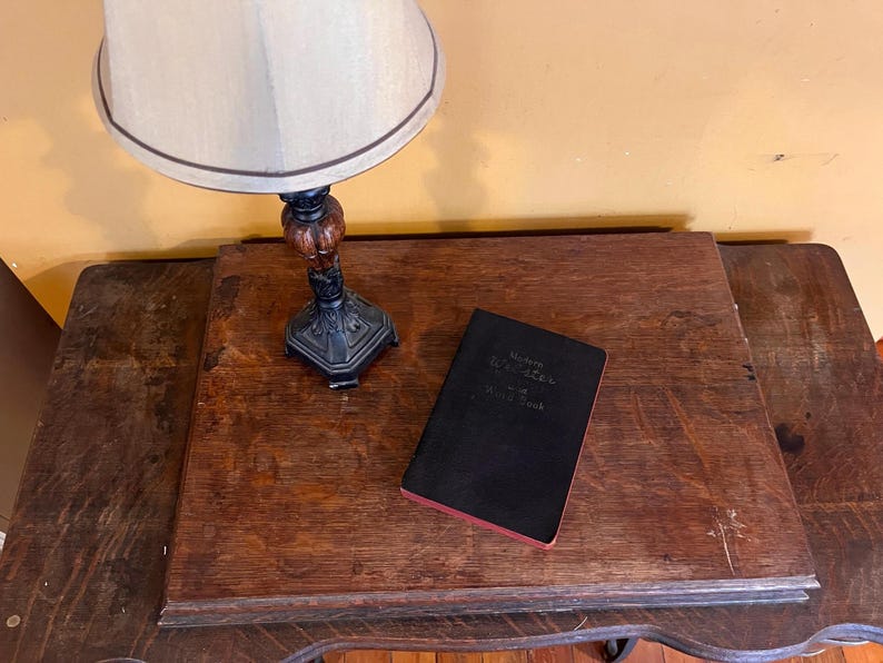 Modern Webster Dictionary and World Book. 1940. Black and gold with red page edges. image 1