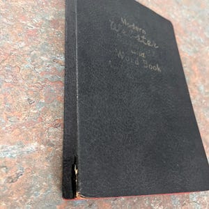 Modern Webster Dictionary and World Book. 1940. Black and gold with red page edges. image 6