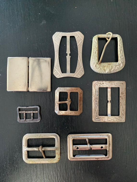 Eight Antique 1920s-40s Metal Belt Buckles