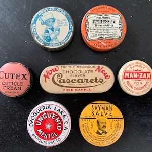 Antiques Set of Seven Advertising Tins