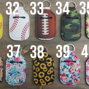 May include: Ten different hand sanitizer bottle holders with keychains. The holders are made of neoprene and have various designs, including baseball, football, camouflage, skulls, donuts, flowers, and sunflowers.