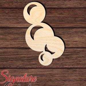 May include: Wooden cutout of a cluster of overlapping circles, resembling bubbles. The circles are arranged in a vertical stack, with the largest circle at the bottom and the smallest circle at the top. The cutout is made of unfinished wood and has a natural wood grain.