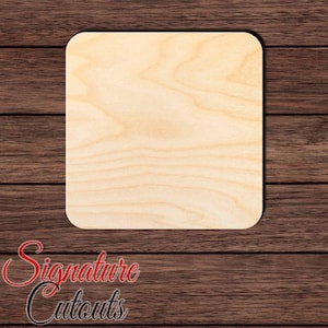 May include: A square wooden cutout with rounded corners, featuring a light beige color and a visible natural wood grain pattern. The surface is smooth and flat, showcasing the organic texture and light tan tones of the wood material throughout.