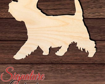 May include: A light-coloured wooden cutout in the silhouette of a West Highland White Terrier dog standing in profile. The cutout features a textured edge representing fur and a pointed tail. The text Signature Cutouts is visible.