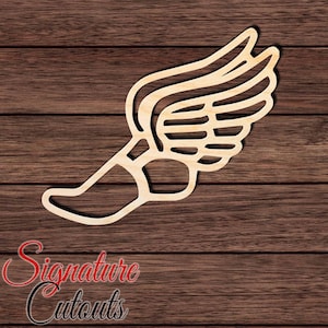 May include: A light-colored wooden cutout in the shape of a winged shoe, featuring a stylized outline of a sneaker with prominent wings extending from the side. The design is flat and laser-cut, showcasing the natural grain of the wood material.