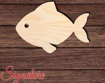 May include: A light-colored, unfinished wooden fish cutout featuring a smooth surface with visible natural wood grain patterns and a single circular hole positioned near the front to represent an eye, presented in a flat, two-dimensional shape.