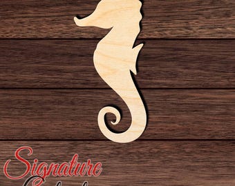 May include: A light-colored, unfinished wooden seahorse cutout featuring a smooth surface with visible natural wood grain patterns. The seahorse is depicted in a side profile orientation with a curved tail and a small fin on its back.