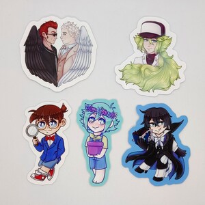 May include: Six illustrated stickers featuring various characters. The first sticker shows two men, one with red hair and black wings, the other with white hair and white wings. The second sticker shows a person with green hair and a white hat. The third sticker shows a person with brown hair and glasses holding a magnifying glass. The fourth sticker shows a person with green hair and a flower crown holding a purple pot. The fifth sticker shows a person with black hair and a black cape. The sixth sticker shows a person with green hair and a white hat.