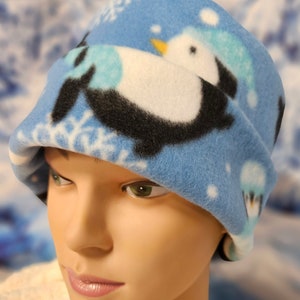 Penguins on Blue Background Fleece Winter Pillbox Hat