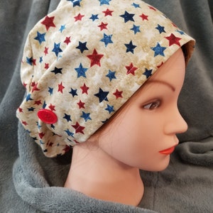 Pixie Style Scrub Cap Beige Background with Red White and Blue Stars, Euro Style Scrub Cap