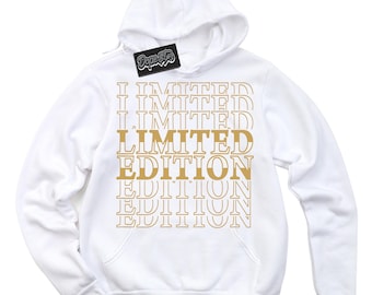 May include: White hooded sweatshirt with the text "LIMITED EDITION" repeated in a stacked pattern in gold lettering.