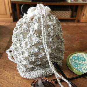 Petit sac à main blanc, sac à dés, pochette