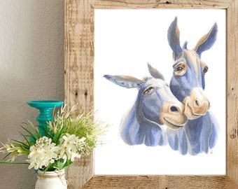 May include: A watercolor painting of two blue donkeys with their heads close together. The painting is framed in a rustic wooden frame and is displayed on a brick fireplace mantel.