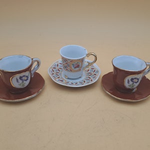 Three Miniature Tea Cups and Saucers By T. Limonges