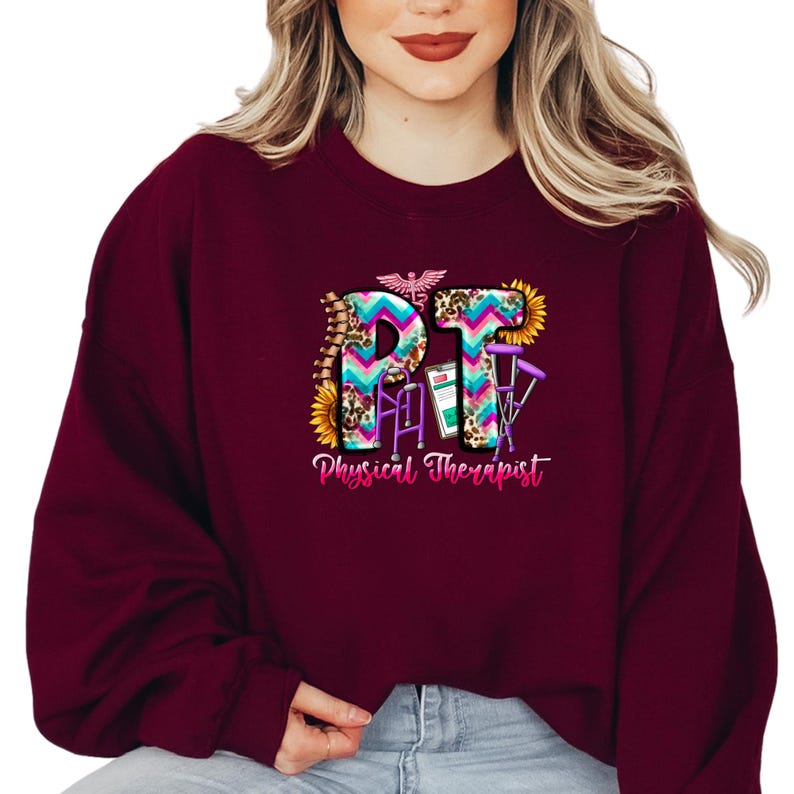 a woman wearing a maroon sweatshirt with the words phi phi phi phi phi phi phi