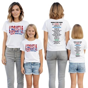 two women and two young girls wearing white t-shirts with the word "Cromia" printed on them.