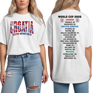 A white t-shirt with text and graphics printed on it, featuring the Croatia national team and the World Cup.