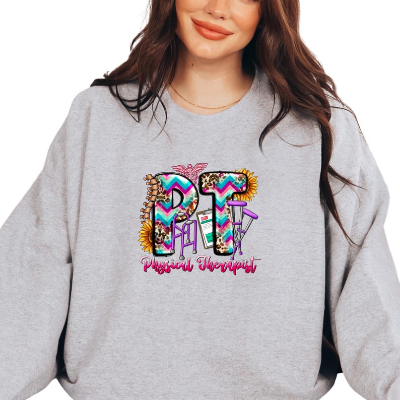 a woman wearing a grey sweatshirt with the word girl on it