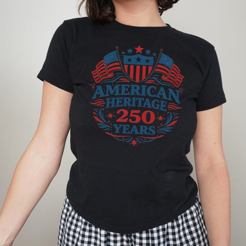 A black t-shirt with a graphic design that says "AMERICAN HERITAGE 250 YEARS" on it.