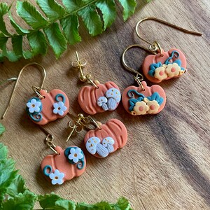 Pumpkin flower dangle earrings, polymer clay, mushrooms, white flowers, gold