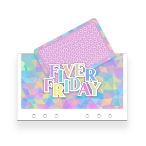 May include: A white planner with the text "FIVER FRIDAY" in colourful letters. A pink card with dollar signs is partially inserted into the planner. The planner has a geometric design in pastel colours.
