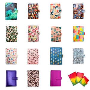 May include: A selection of patterned journals with magnetic clasps. Designs include floral, animal, and abstract patterns. The journals are rectangular and vary in size.