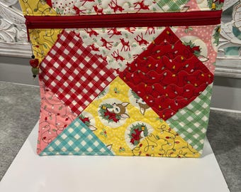 Christmas project bag, large 12”tall x 12” wide. Pieced  front with retro Christmas print.Custom quilted for your Christmas stitching