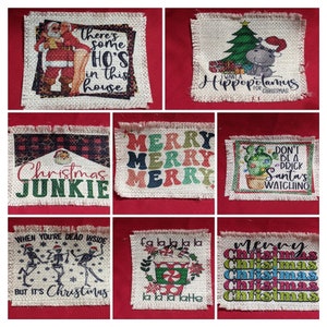 May include: Nine different burlap patches with various Christmas-themed designs. The designs include a Santa Claus, a hippopotamus, a cactus, skeletons, a coffee cup, and the words "Merry", "Christmas Junkie", "There's some Ho's in this house", "I want a Hippopotamus for Christmas", "Don't be a prick Santa's watching", "When you're dead inside but it's Christmas", "fa la la la la la la latte", and "Merry Christmas".